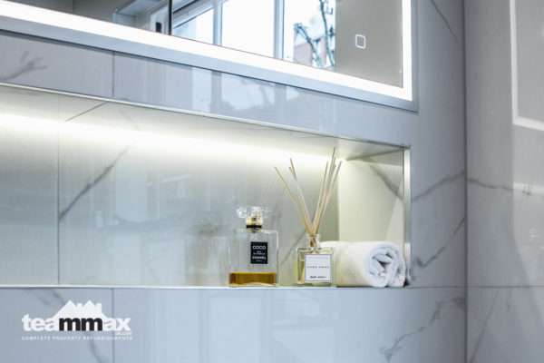 Recessed shelf with metal trim